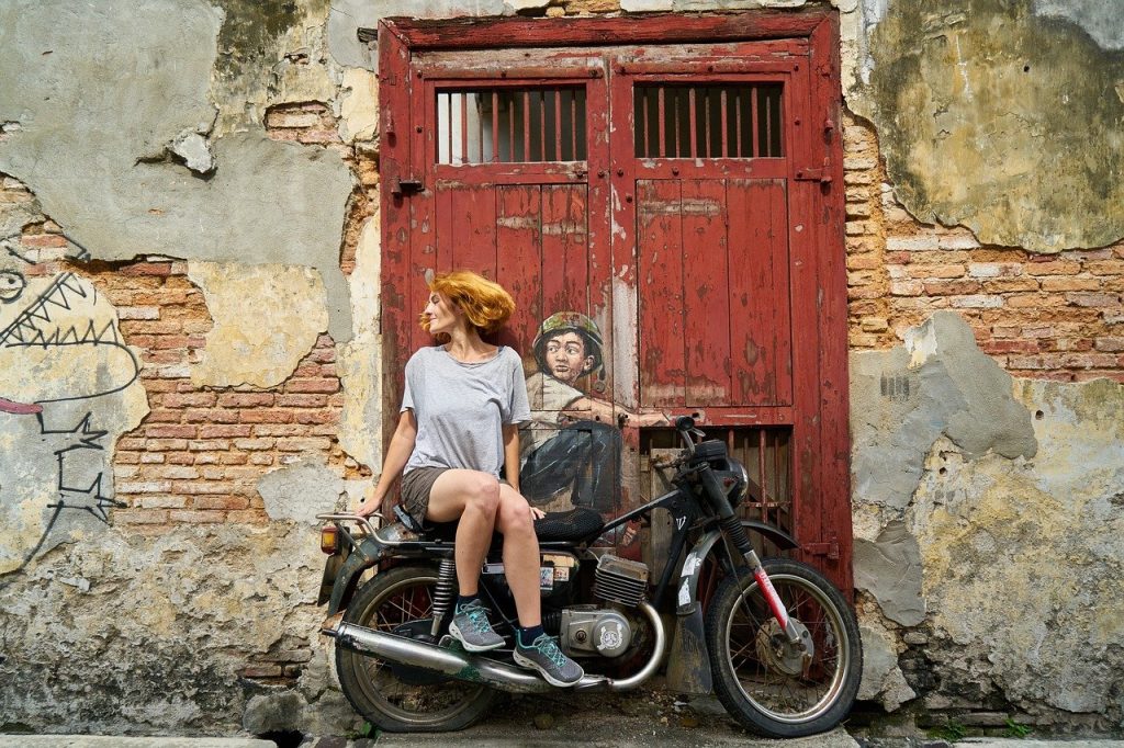 motorcycles, woman, graffiti
